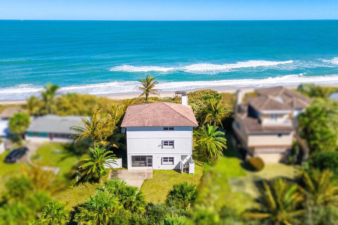 OCEANFRONT NO HOA Located in desirable south Melbourne Beach, this UPDATED 3 story single family home, with balconies on the 2nd and 3rd floors, plus a bonus room and a ...