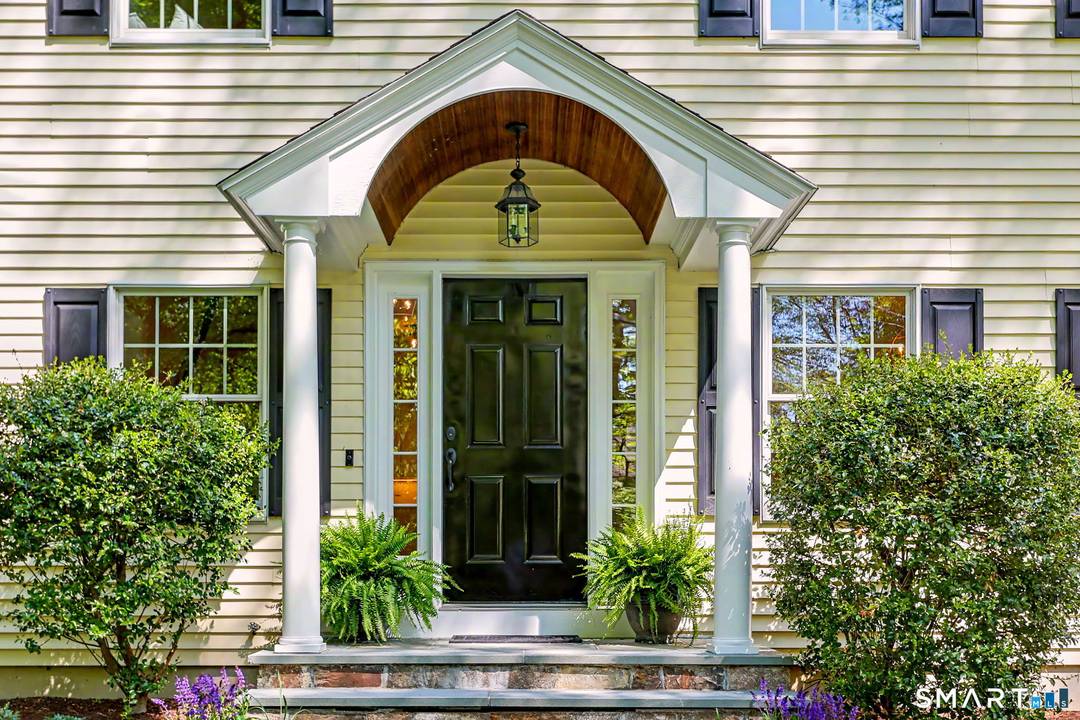 Welcome to this beautifully maintained four bedroom residence in the heart of New Canaan, where timeless New England colonial architecture is thoughtfully paired with modern comfort and refined living.