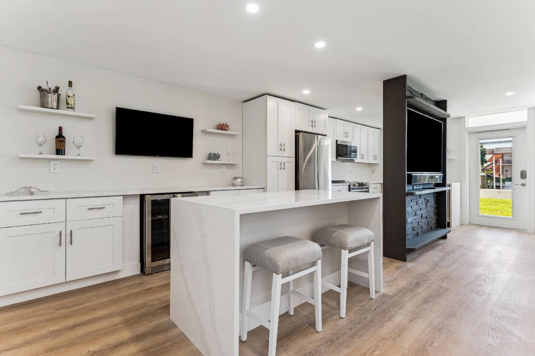 Waterfront living in a completely renovated furnished condo !