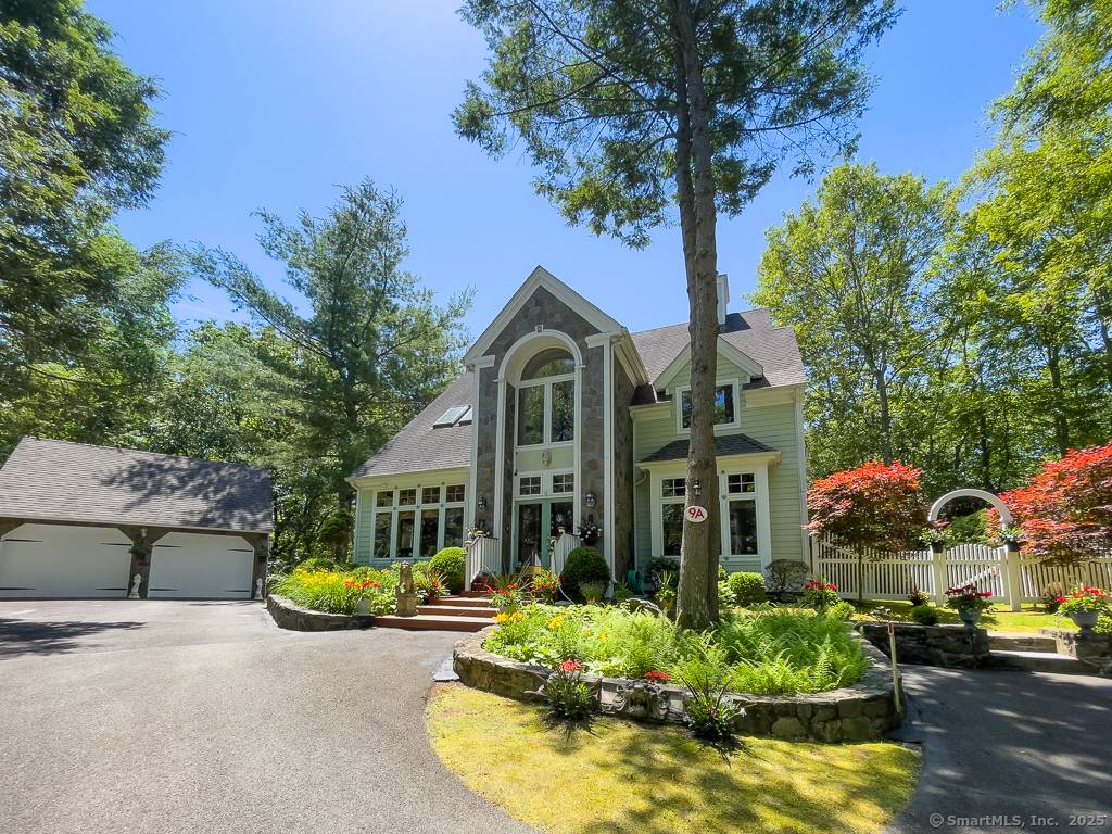 Tucked away on a private, level 2 acre lot near Candlewood Lake and Lake Lillinonah, this custom built Post Beam home offers a perfect blend of rustic charm and modern ...