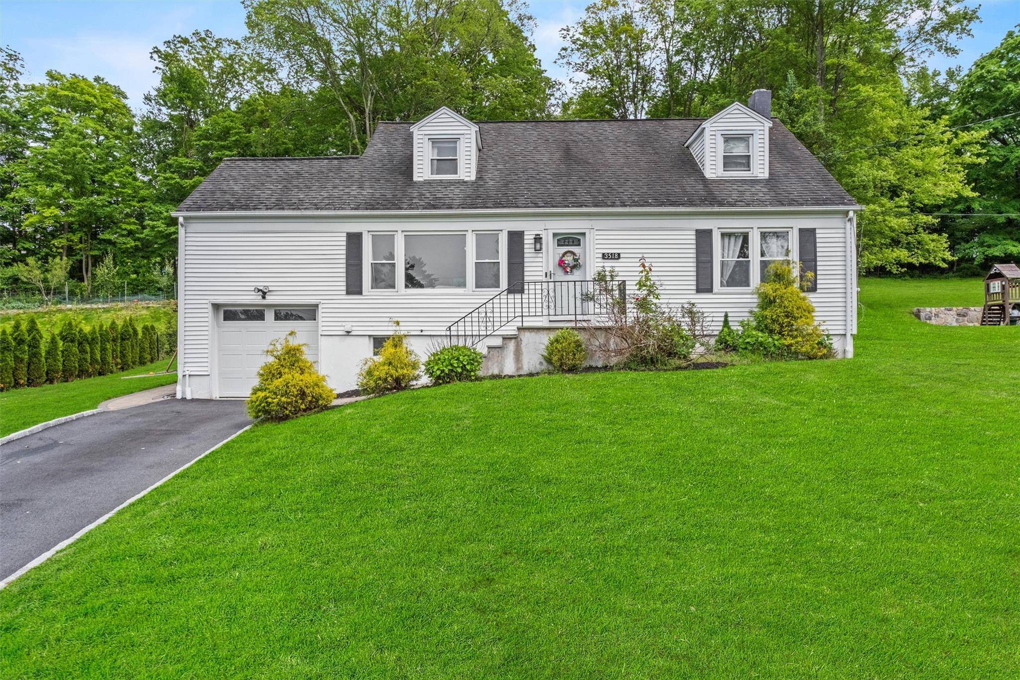 Welcome to this warm and inviting 4 bedroom Cape Cod, ideally located in a sought after neighborhood that blends tranquility with convenience.
