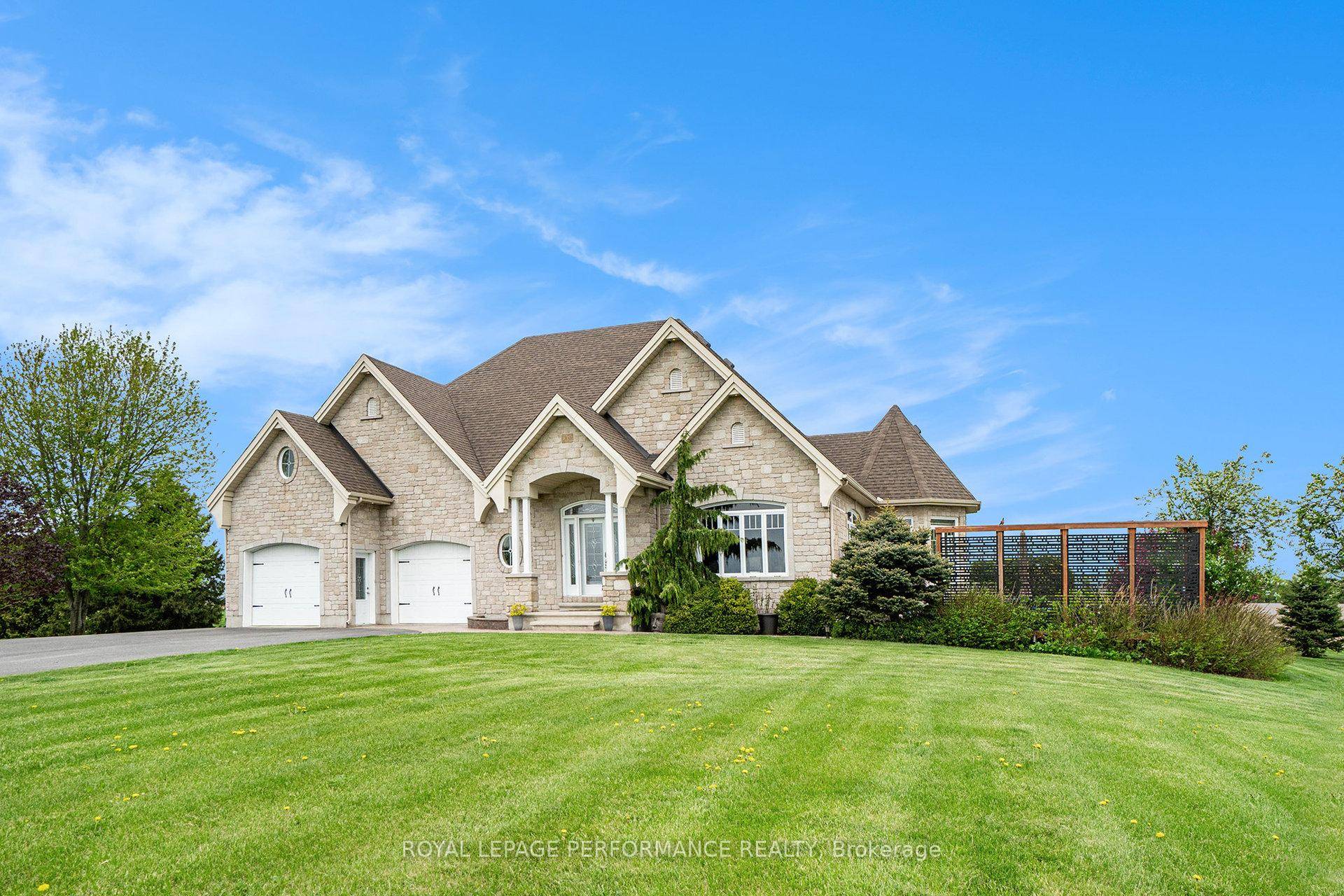 Step into this stunning 3 bedroom, 2 bathroom bungalow, where modern elegance meets cozy charm, all designed for low maintenance living.