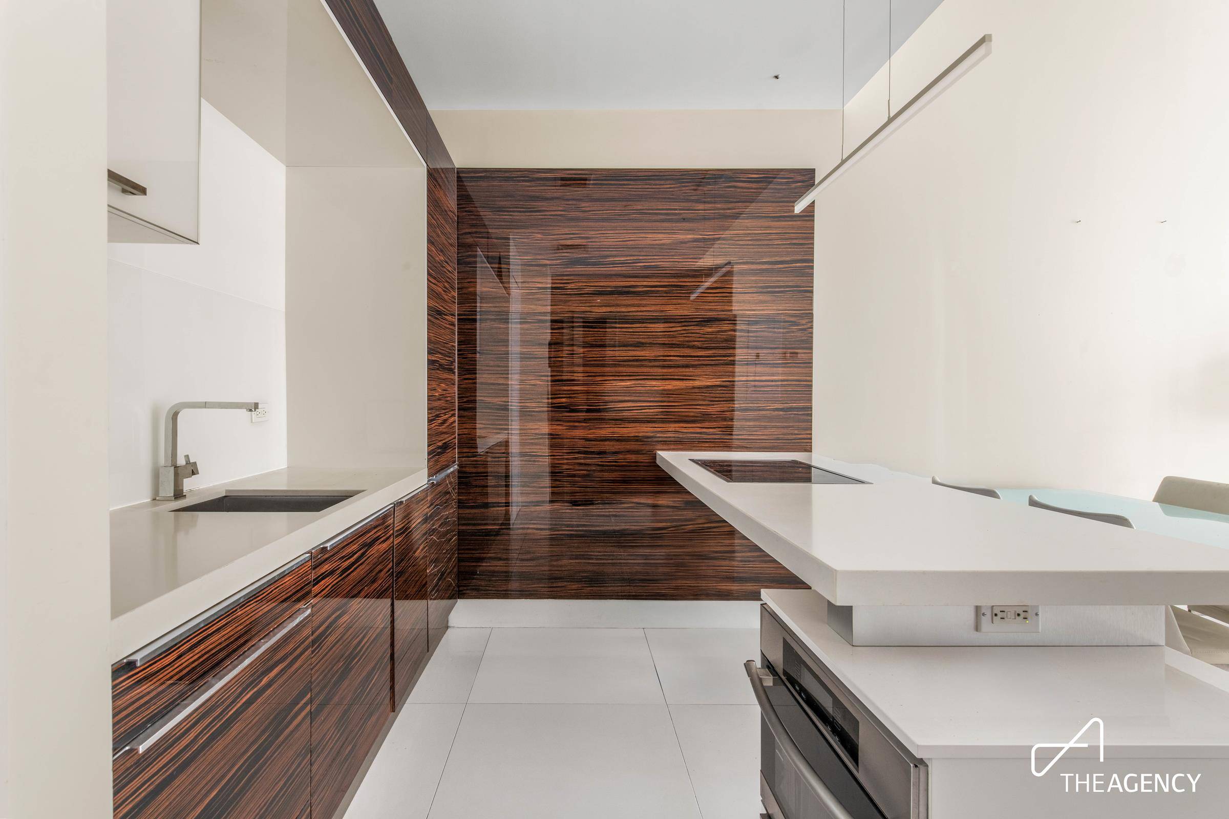 Experience sophisticated city living in this beautiful one bedroom, one bathroom condo featuring soaring 11 foot ceilings and expansive windows that flood the space with natural light.