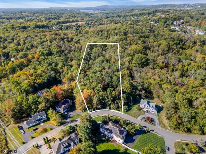 Discover the perfect canvas for your custom home on this beautiful, wooded lot nestled along a peaceful cul de sac.