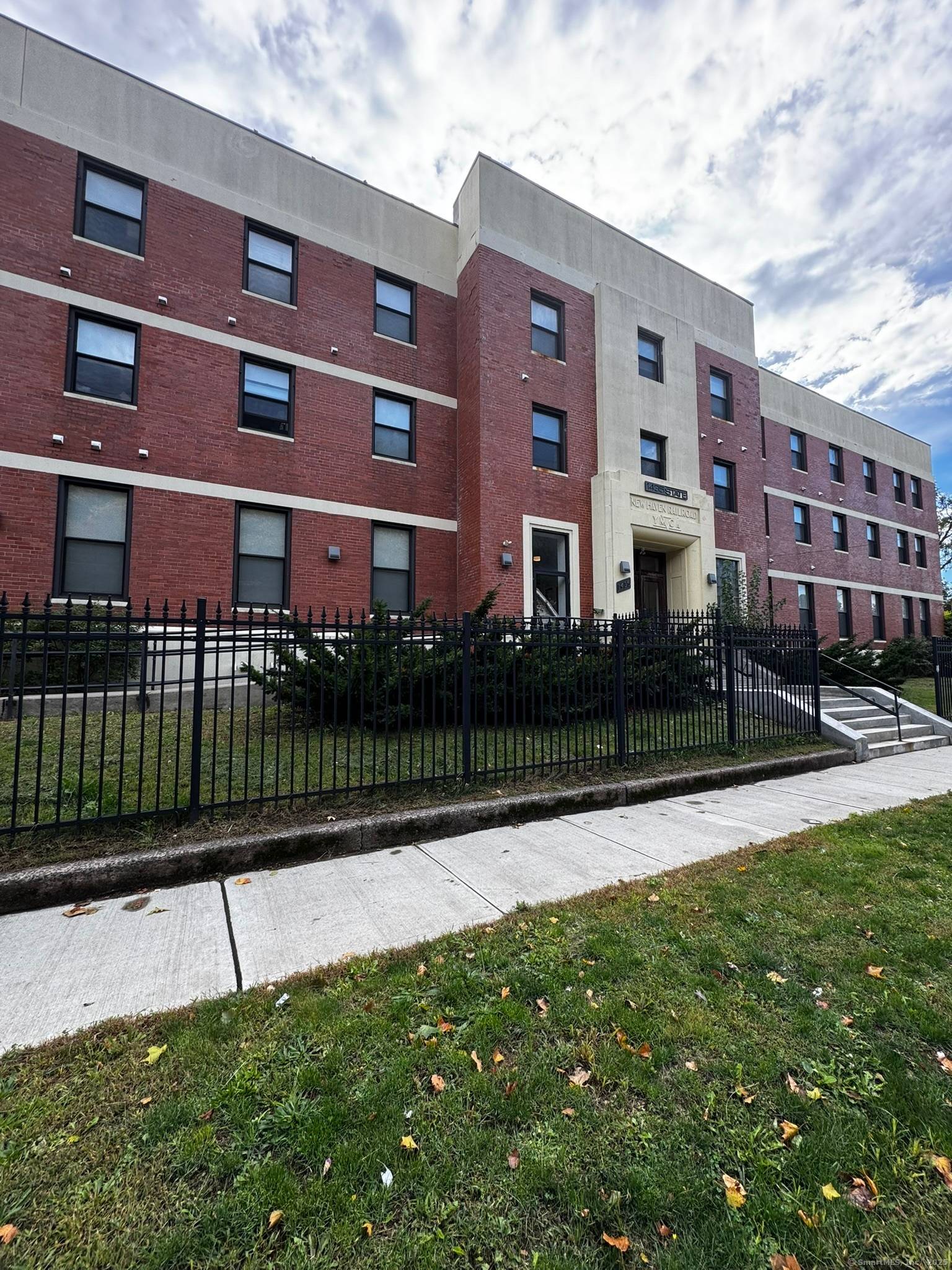Exceptional investment opportunity in a beautifully restored historic brick building, once home to the local YMCA and railroad boarding house.