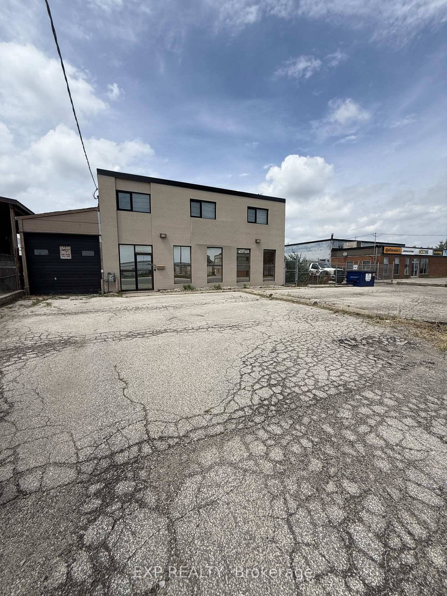 Freestanding building with outside storage in prime Mississauga location.