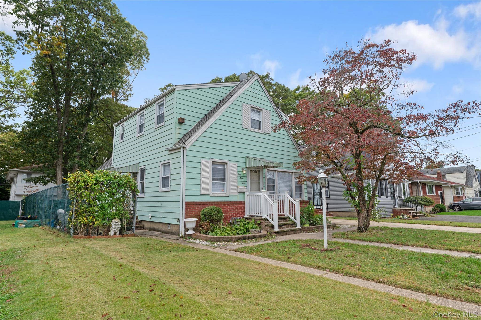Welcome to this beautifully maintained 4 bedroom, 2 bath single family home situated on a quiet, residential street in Hempstead.