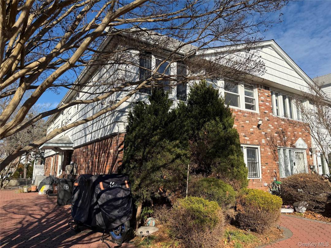 Meticulously Renovated Two dwelling Home in Bayside, Oakland Gardens, South Facing on a Serene Corner Lot !