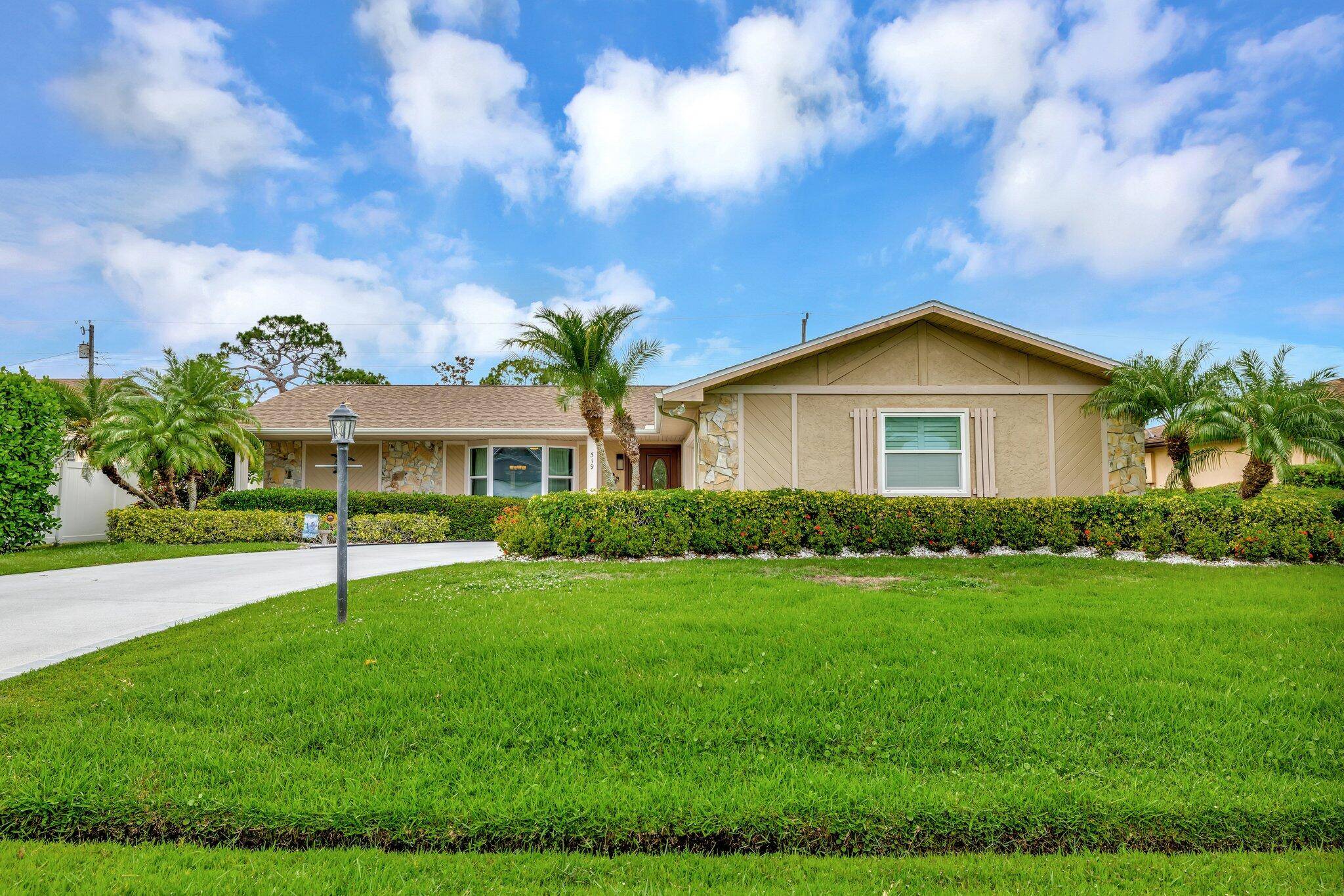 Completely Remodeled 3 Bedroom, 2 Bathroom with Heated Screened Pool on Quiet Street.