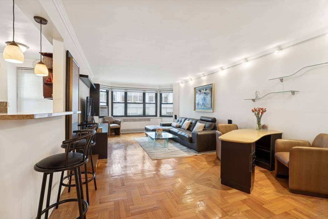 Beautiful, expansive, bright and sophisticated, furnished one bedroom home at Lex 54 condominium in prime Midtown East.