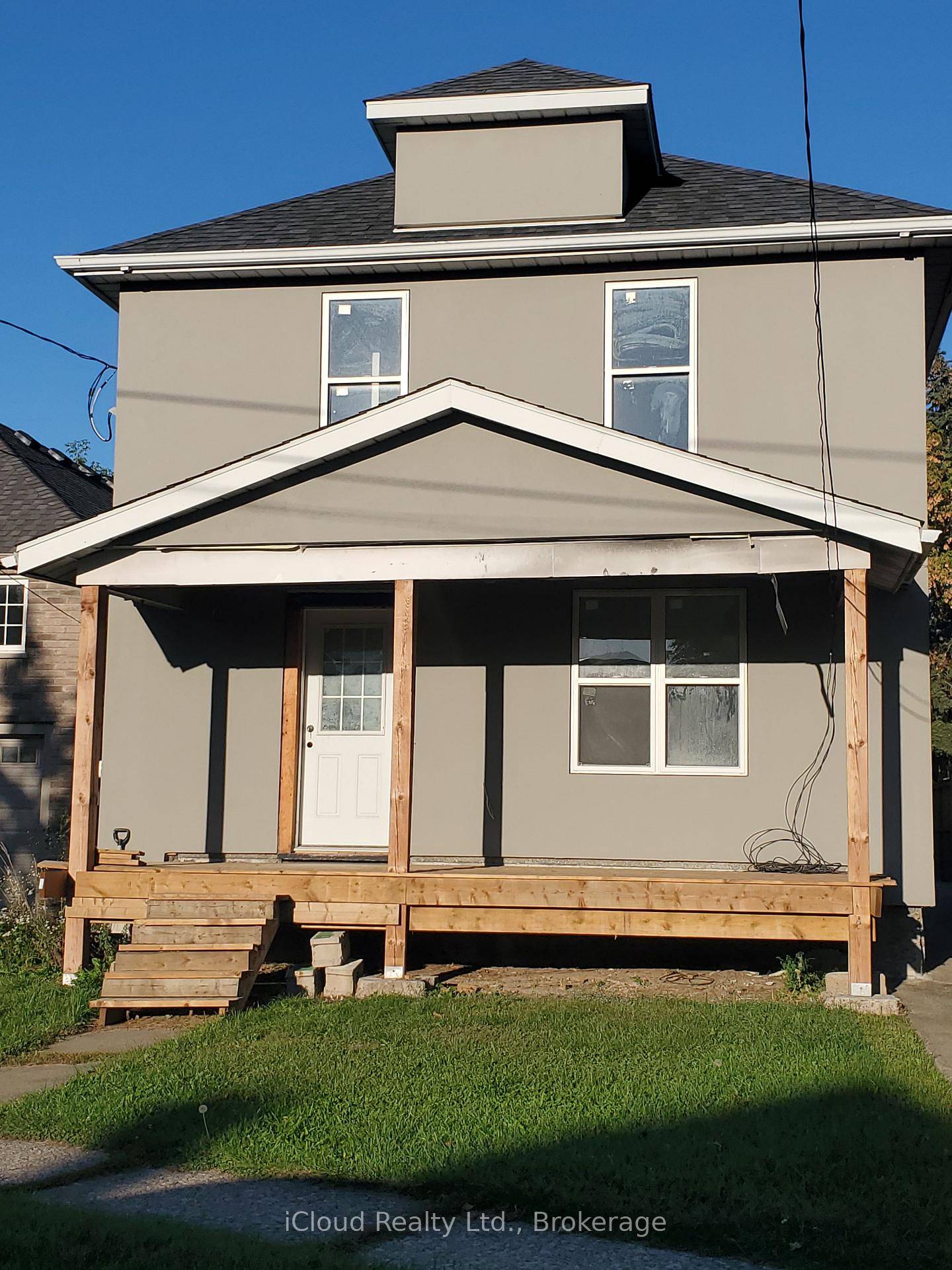 Extensively renovated duplex with major updates throughout !