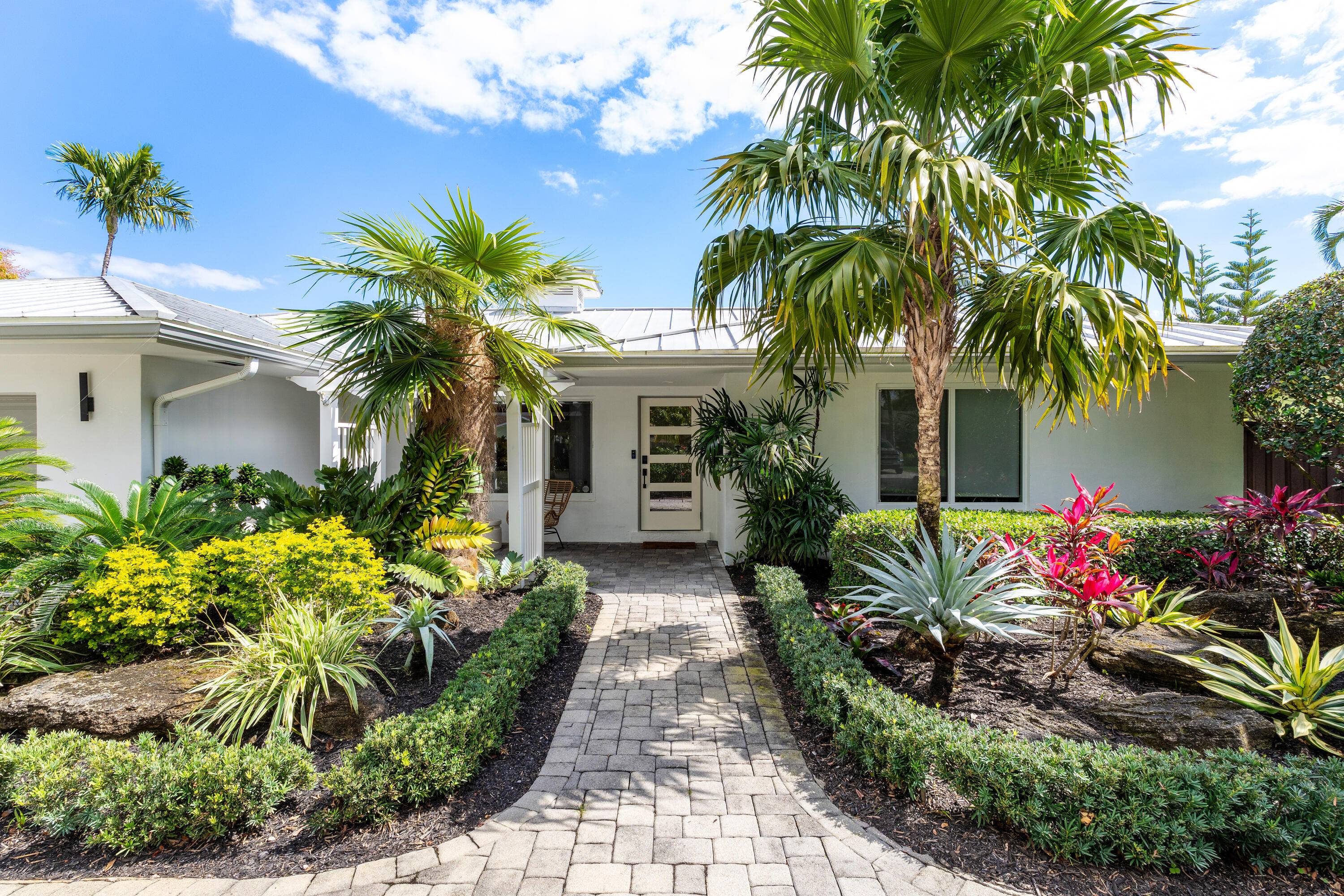 Discover the epitome of Lake Ida living w this gorgeous transitional coastal gem.