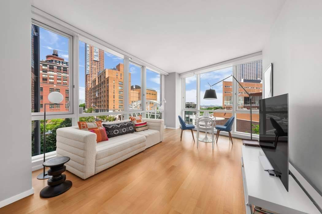 Rarely available, this corner two bedroom, two bathroom home boasts spectacular views of the Hudson River and Washington Market Park from every room.