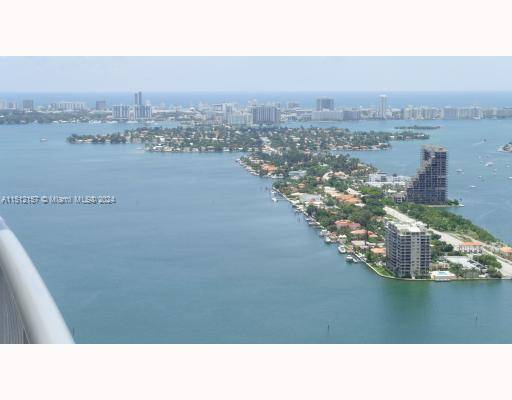 Spectacular and large one bedroom Penthouse apartment with one of a kind views of South Beach, Miami, Fisher Island and beyond.