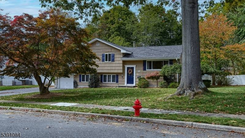 Welcome to 21 Cardinal Drive, a charming three bedroom home nestled in one of Oakland's most sought after neighborhoods.