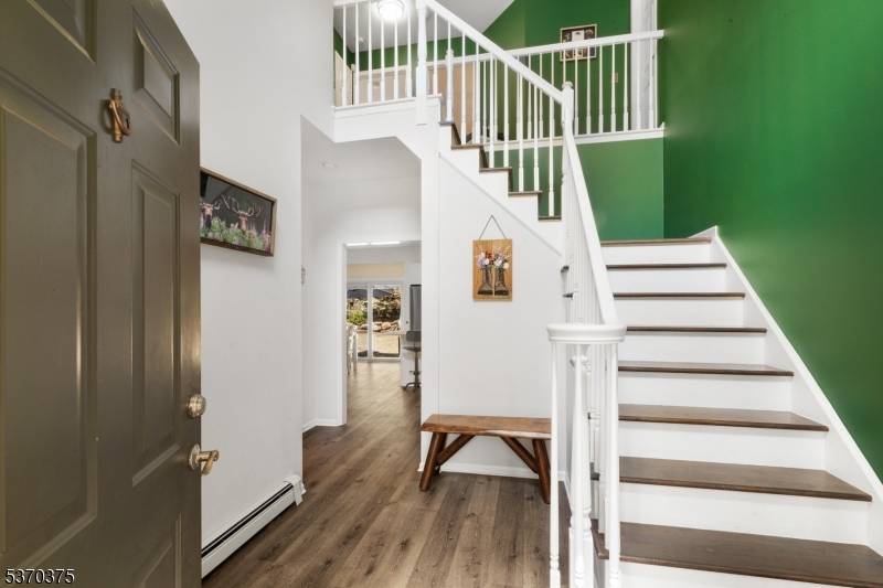 Tucked away on a secluded lot, this Colonial home offers the perfect blend of privacy, space, and natural beauty.