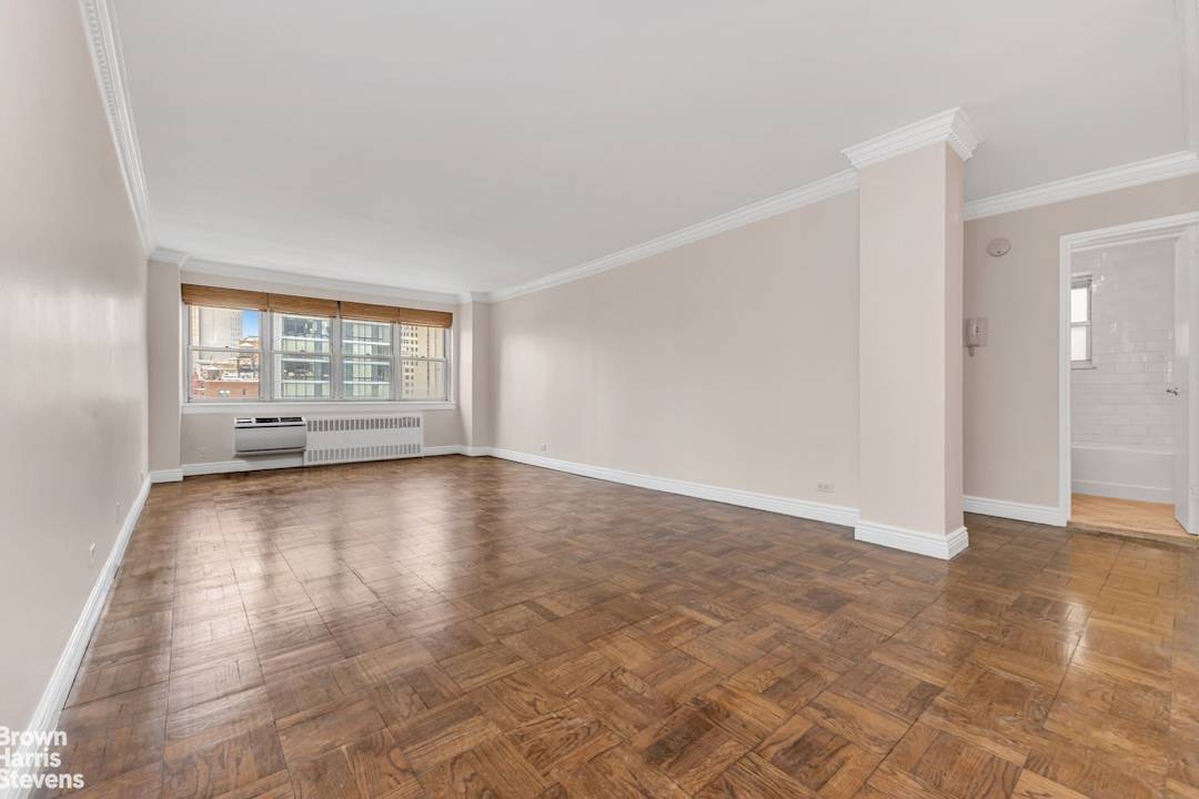 Oversized High Floor 1 Bedroom with Iconic Empire State Building Views Perched on the 20th floor of a sought after full service condominium just off Third Avenue, this oversized 1 ...