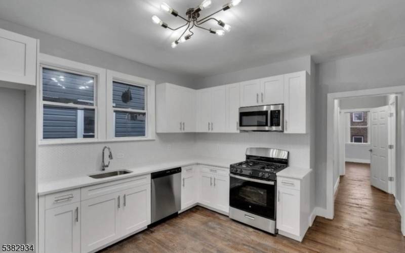 Excited to present this charming two family residence in Newark now on the market and move in ready.