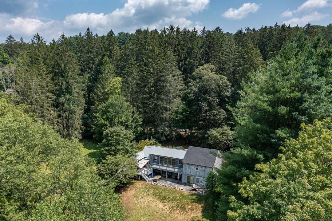 Tucked away on 3. 28 pristine acres in Connecticut's rolling countryside, this captivating residence offers a rare opportunity to own a place where nature, serenity, creative energy converge in perfect ...