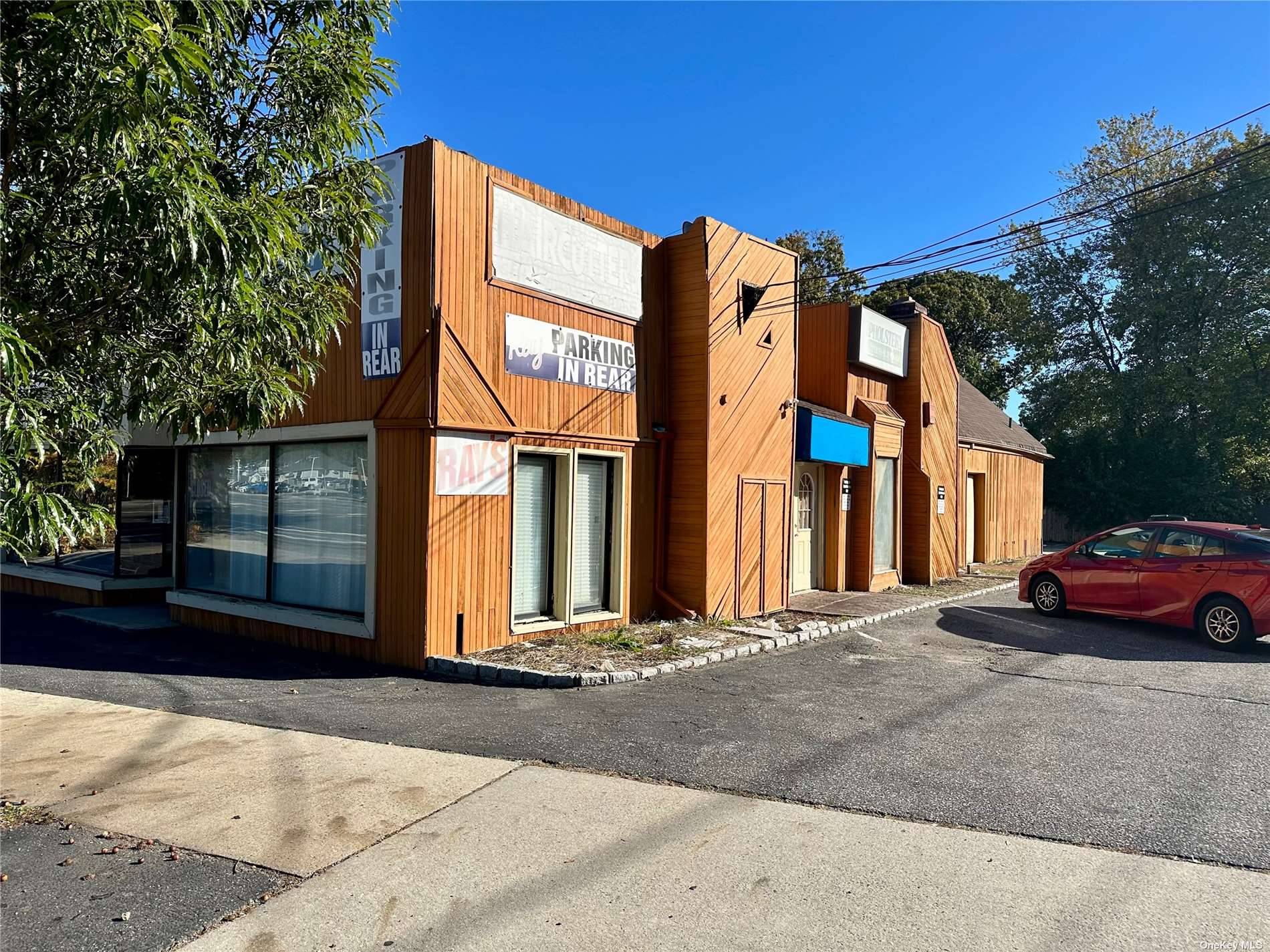 approx 4000 sq ft building 2 levels commercial zoning full basement street level 2 store fronts second level storage apartment