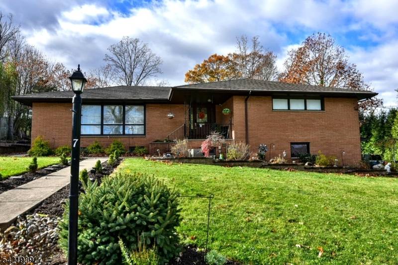 A wonderful opportunity awaits with this beautifully crafted custom brick ranch.
