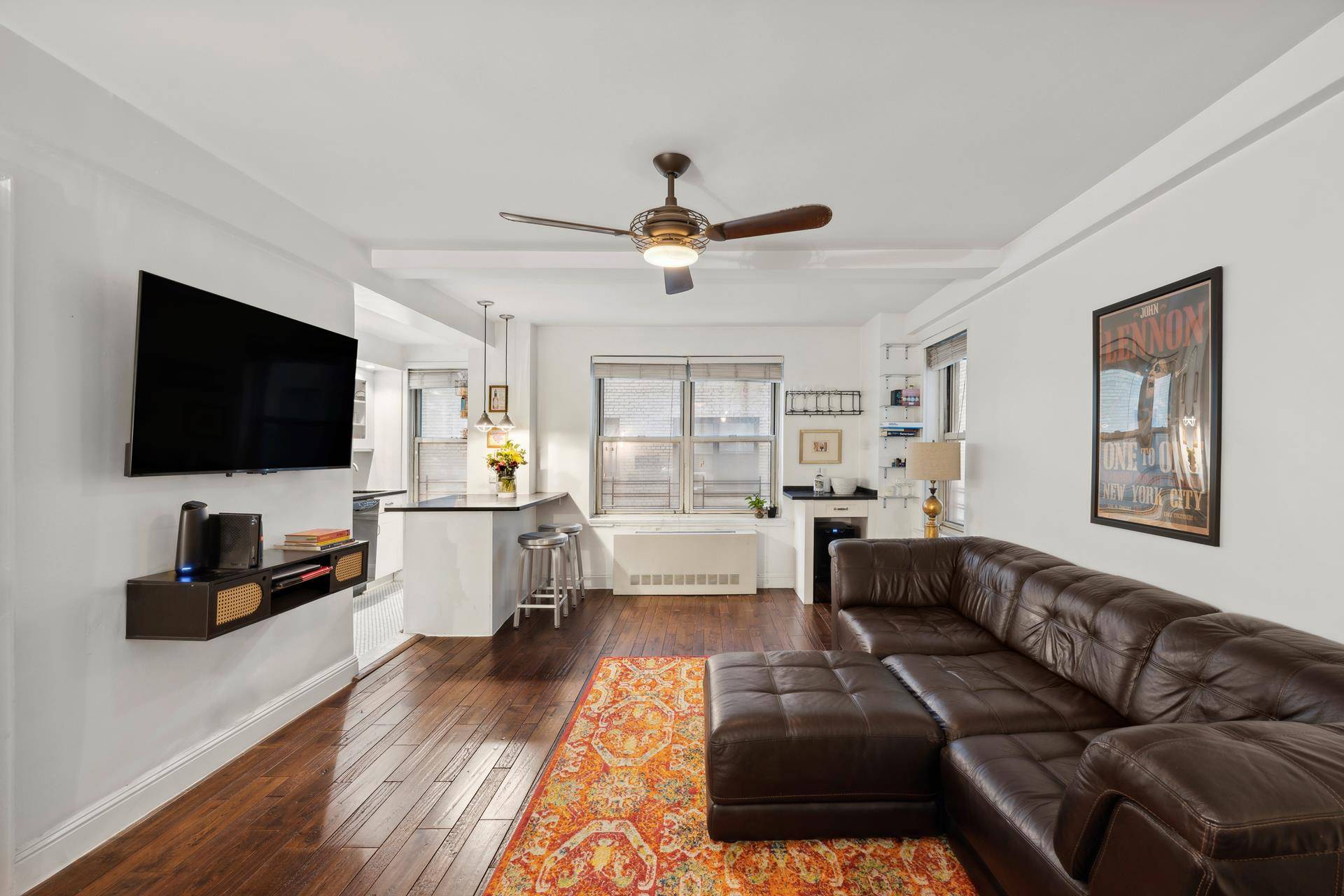 Welcome to Apartment 2D at 424 East 52nd Street, where elegance meets modern convenience in the heart of New York's famed Beekman neighborhood.