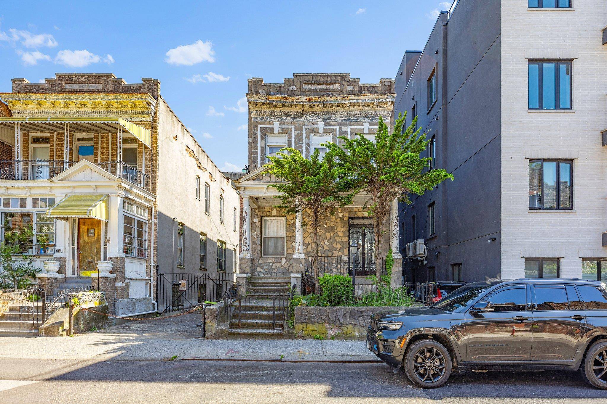 Unlock the full potential of this rare detached two family brick residence in the heart of Crown Heights.