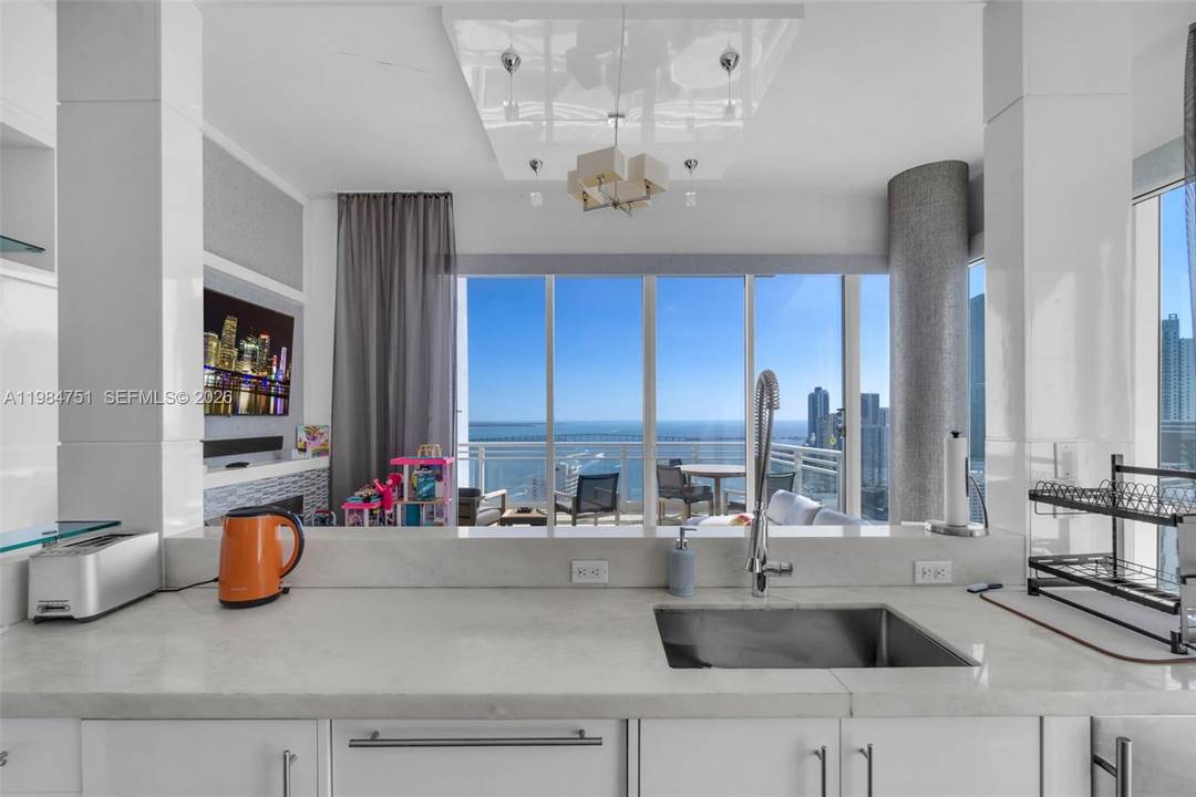 Experience elevated living at Unit 2904 in Asia Brickell Key, a premier high rise residence showcasing sweeping views of Biscayne Bay and the Miami skyline.