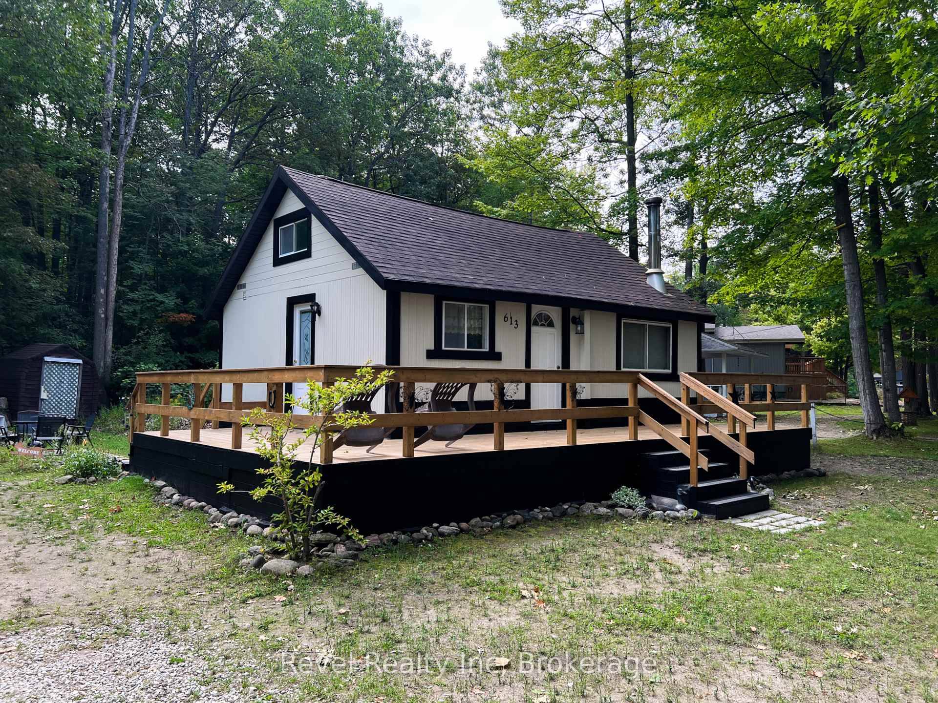 Welcome to 613 Oxbow Park Drive Your Riverside Retreat Awaits !