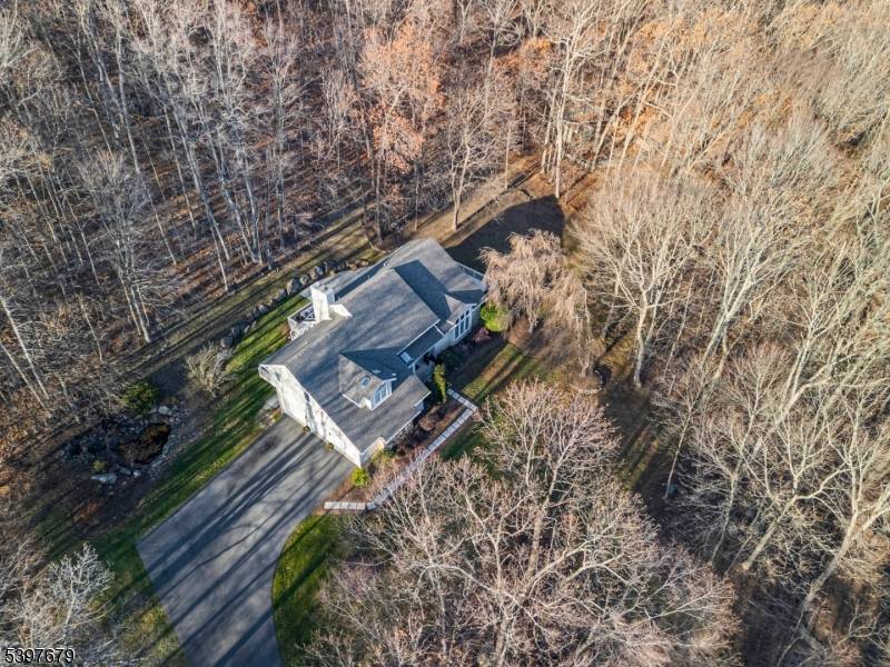 Rare opportunity to own a stunning custom contemporary home w striking architectural design that sits on 5.