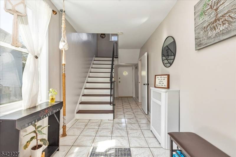 Welcome to 296 Berkeley Avenue a thoughtfully updated two family home in the heart of Bloomfield offering the perfect blend of comfort, flexibility, and opportunity.