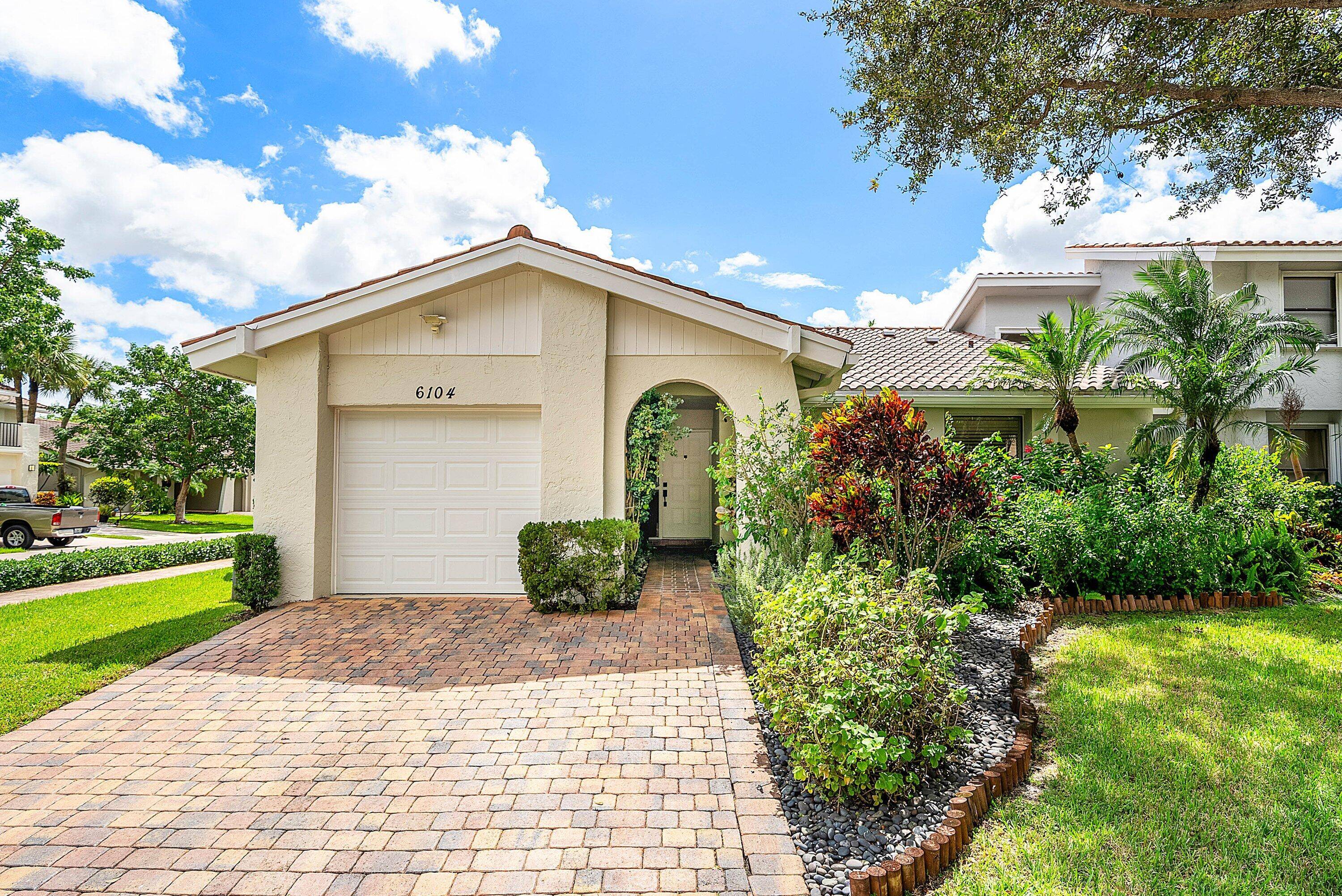 This updated and impeccably maintained 3 bedroom, 2 bathroom home features vaulted ceilings, tile floors, LED lighting, and a split bedroom layout.