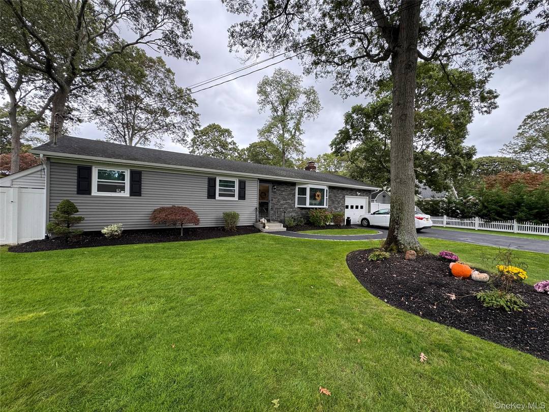 Welcome to this beautifully remodeled 4 bedroom, 2 bath ranch with attached garage and full basement that perfectly blends modern upgrades with timeless comfort.