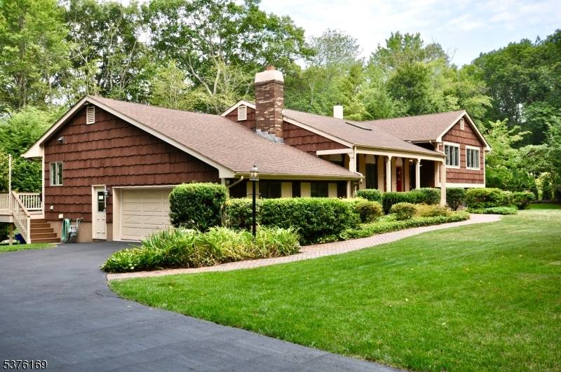 Nestled in the Highlands of NJ, this majestic, custom home rests prominently in Kensington Wood, one of Ringwood's most preferred neighborhoods.
