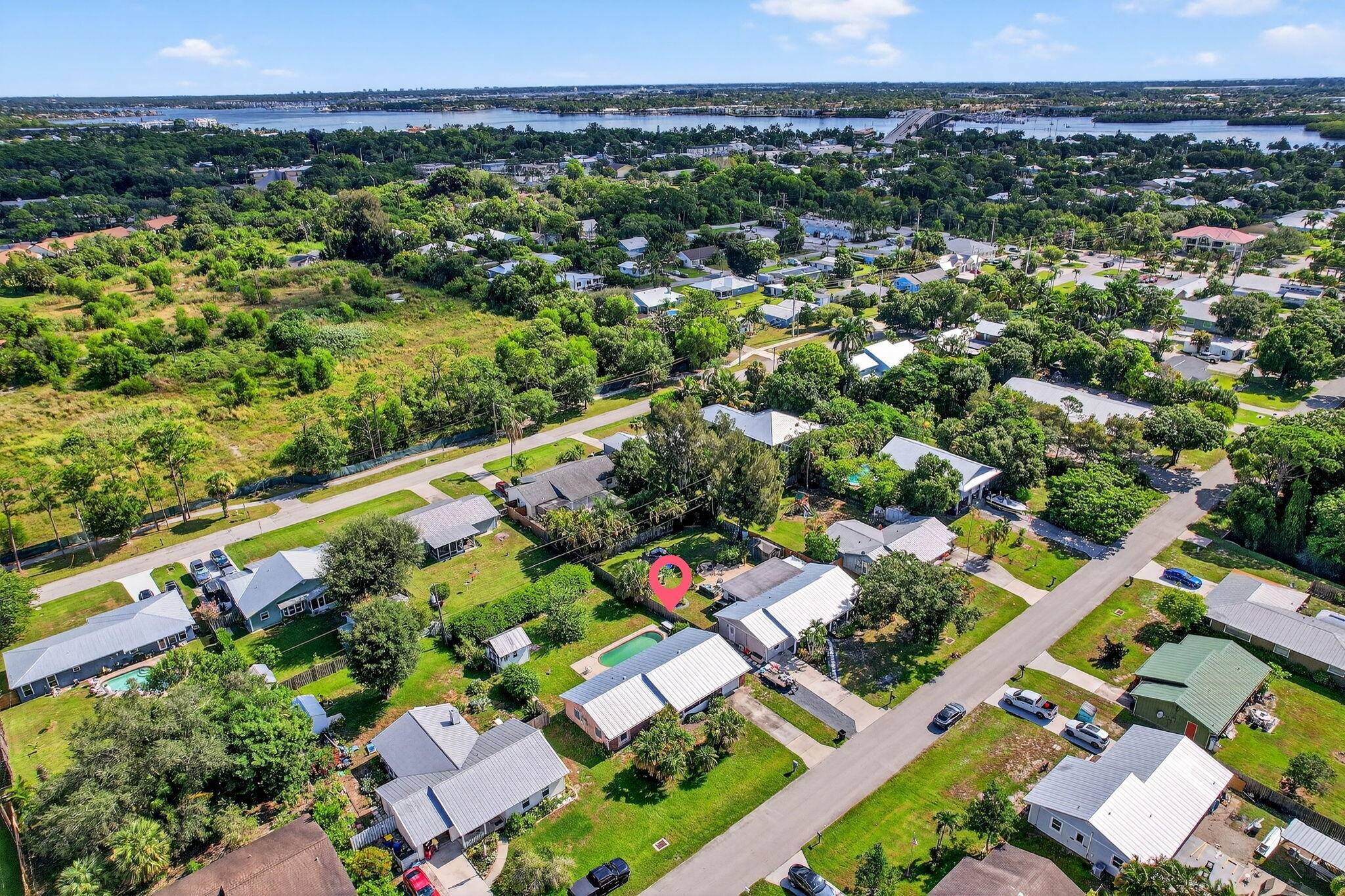 Welcome to this inviting 3 bedroom, 2 bathroom pool home in a fantastic Palm City location !
