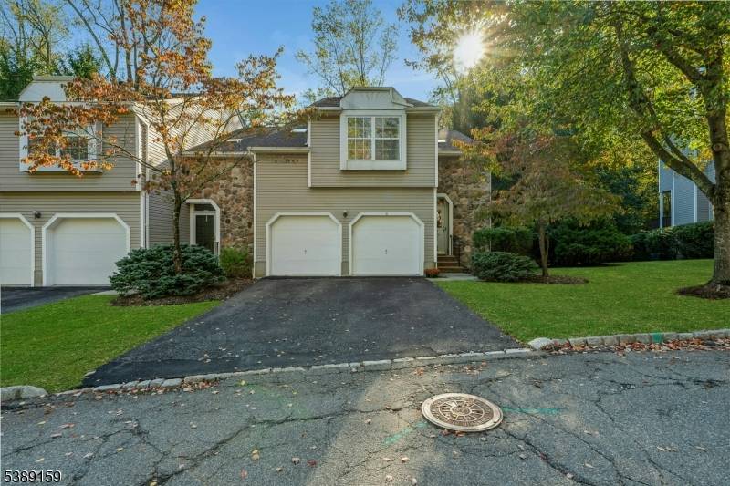 Welcome home to 8 Rebecca Lane, a sunfilled end unit located on a sucluded cul de sac in Indian Springs.
