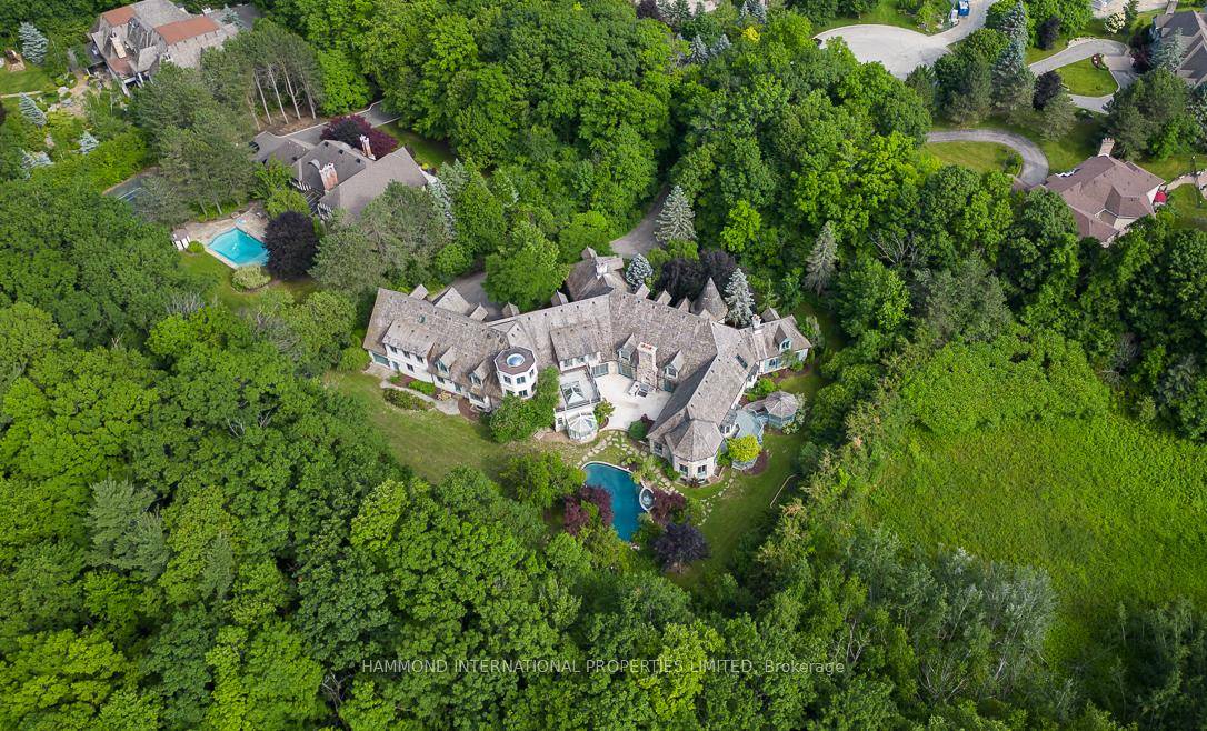 Welcome to 76 Quail Run an opportunity like no other, an unparalleled masterpiece tucked away on 1.