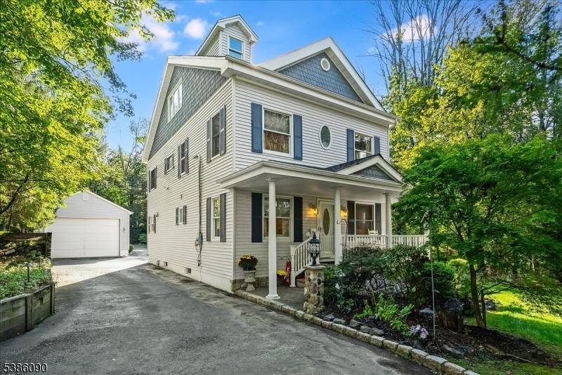 Set on a quiet private road, this beautifully appointed 5 bedroom, 5 bath residence combines warmth, character, and modern convenience.