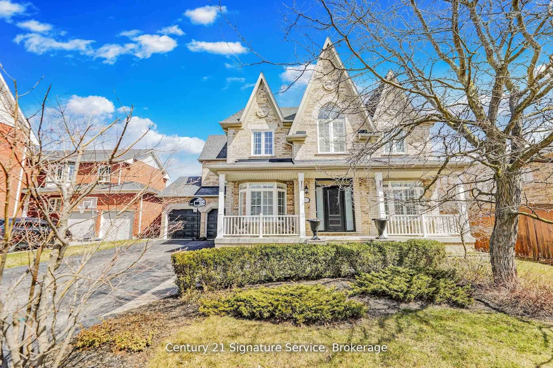 REDUCED PRICE ! Experience the allure of this stunning 5 2 bedroom brick home in the coveted Old Meadowvale Village.