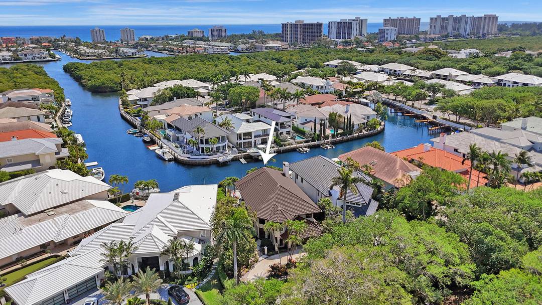 Located in the prestigious Boca Marina Yacht Club community, this exquisite 5, 200 SF, east exposure waterfront estate offers panoramic long water views and direct ocean access for boating.