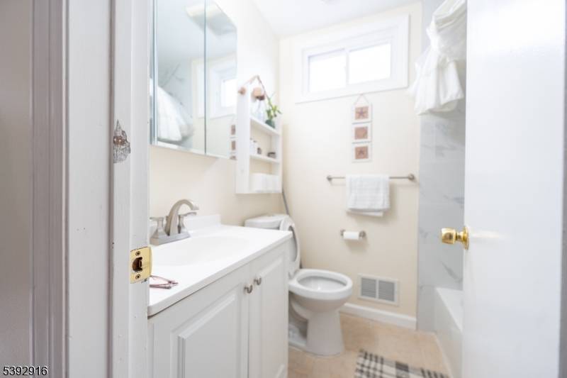 Welcome to this spacious 4 bedroom, 2 bath home perfectly situated in one of Perth Amboy's most sought after neighborhoods.