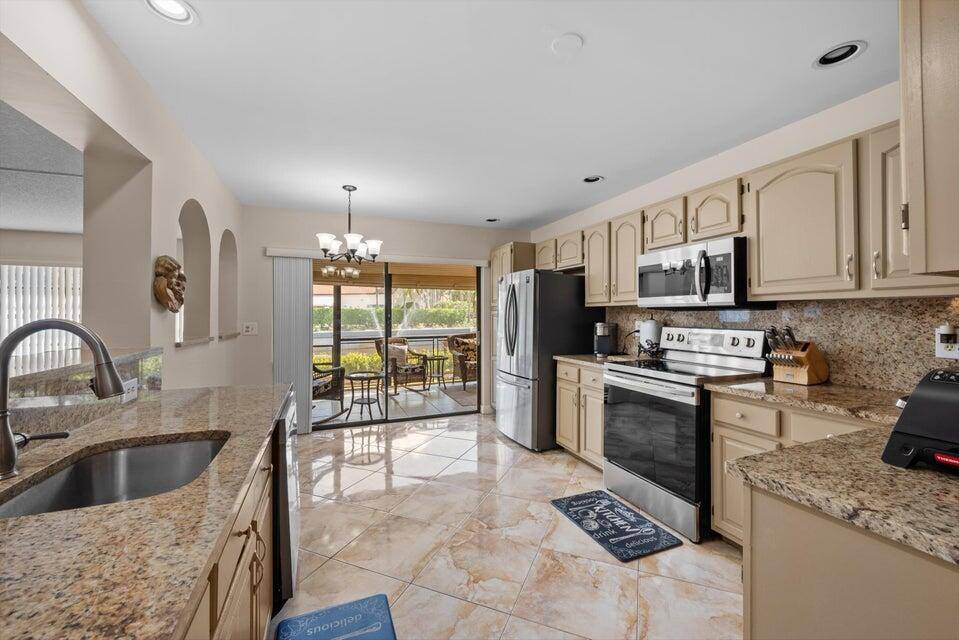Welcome to this stunning first floor unit in a vibrant 55 community.