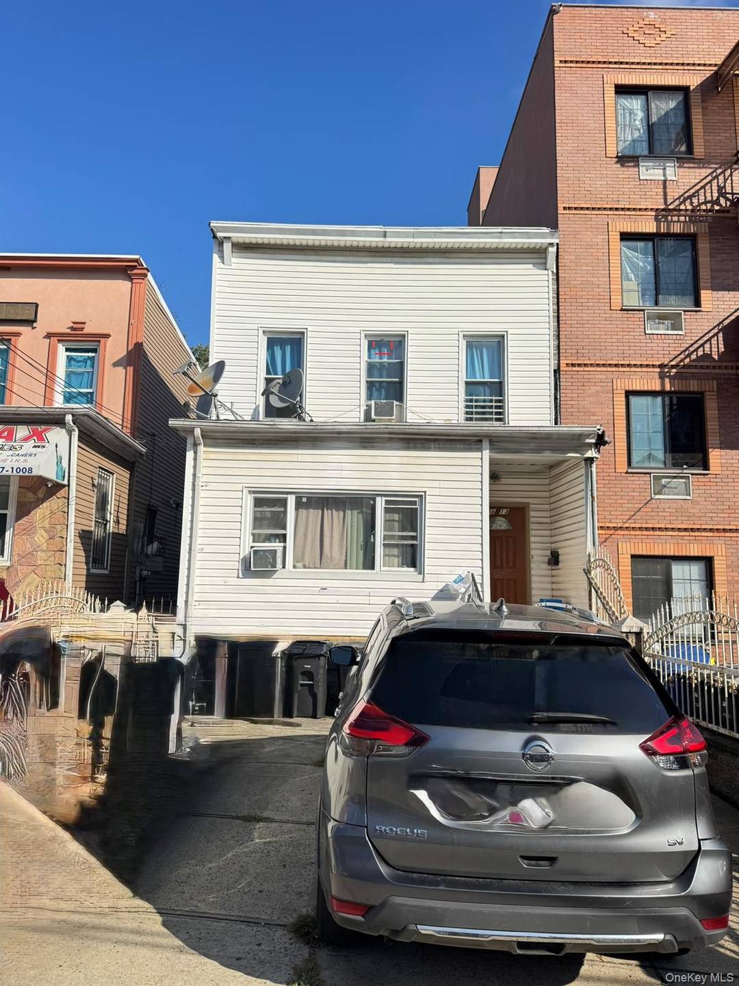 Welcome to this well maintained 2 family house in the heart of Corona.