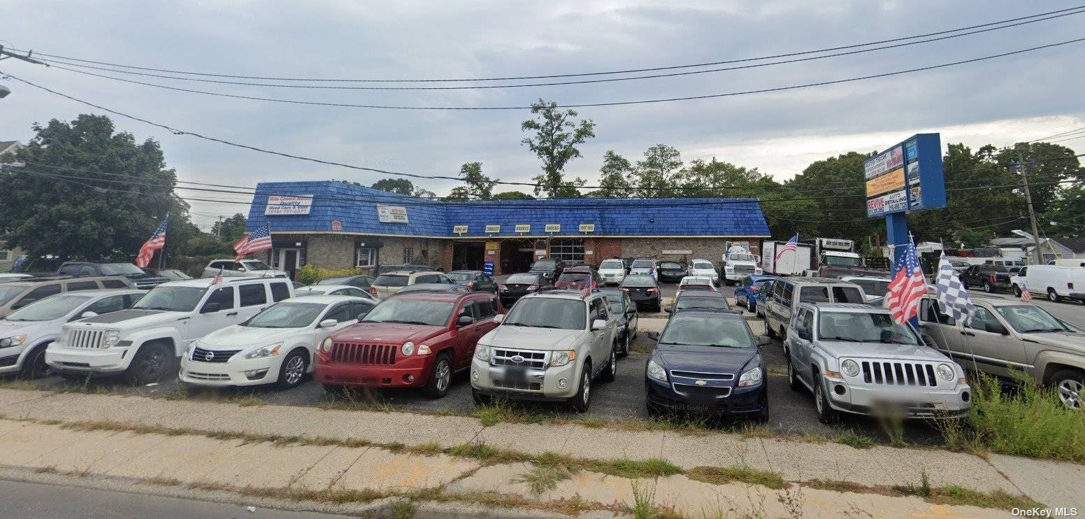 2, 400 SF of Auto Space with 4 Bays Available.