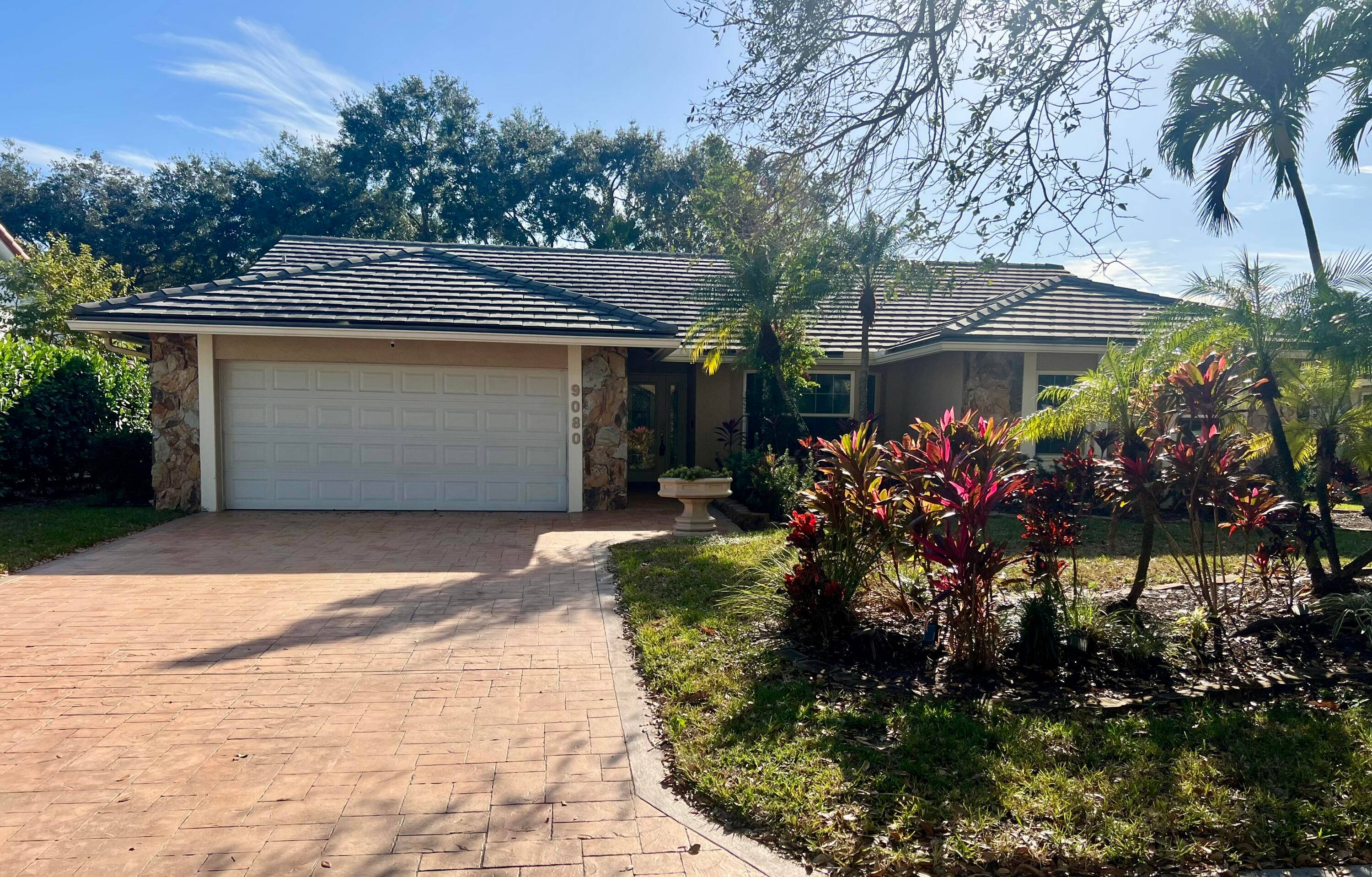 Price Reduction ! This CBS constructed home features a spacious layout with dual living areas, vaulted ceilings, ceramic tile floors no carpet here IMPACT glass and doors, 2009 tile roof ...