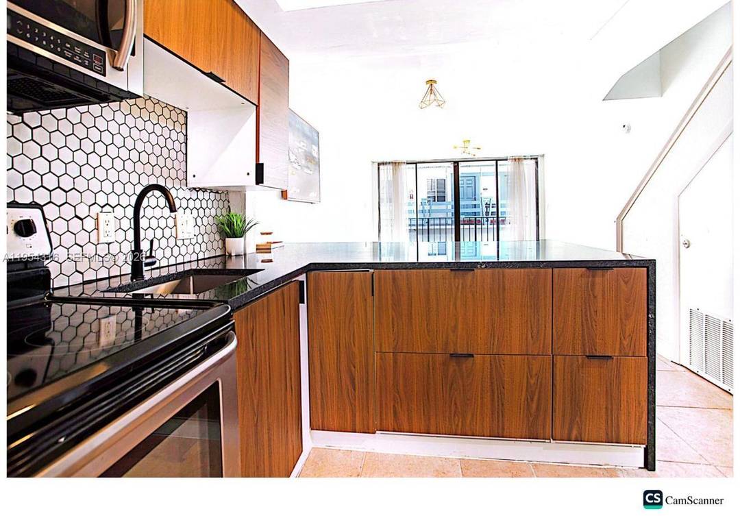 FULLY REMODELED NEW AC UNIT NEW WATER HEATER NEW ELECTRIC BOX NEW KITCHEN Beautifully updated condo located in the desirable Quarterdeck Condominium in Fort Lauderdale.