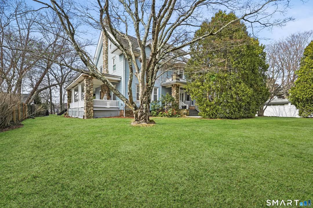 Home with seasonal water views of Holly Pond.
