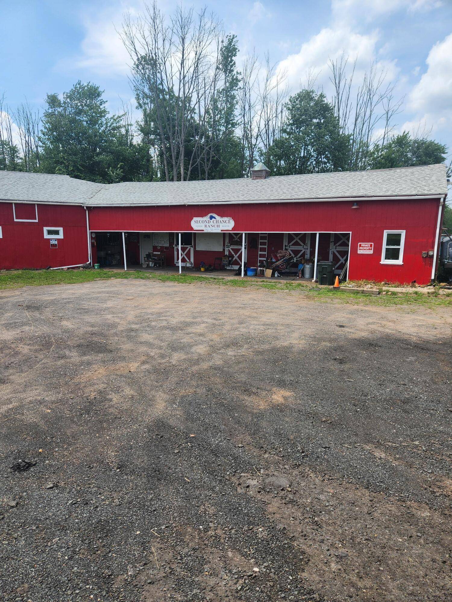 Great 59. 2 acre piece of land on the back side of the Airport.