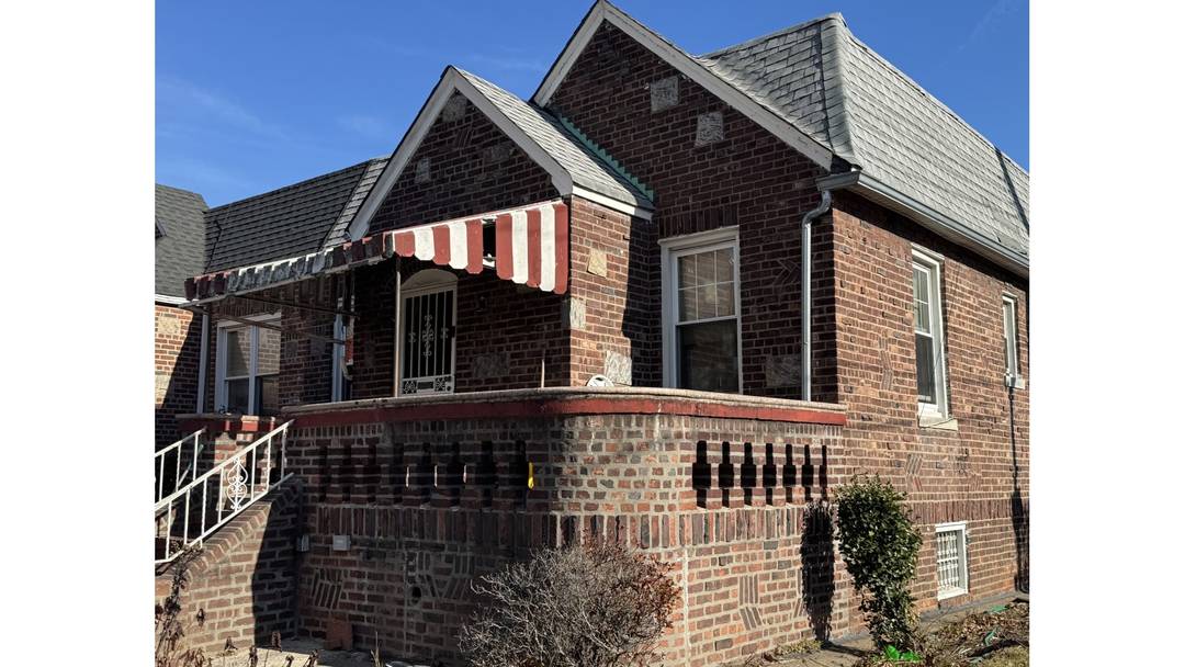 ... Discover the potential of this brick, single family corner home offering incredible value and versatility.