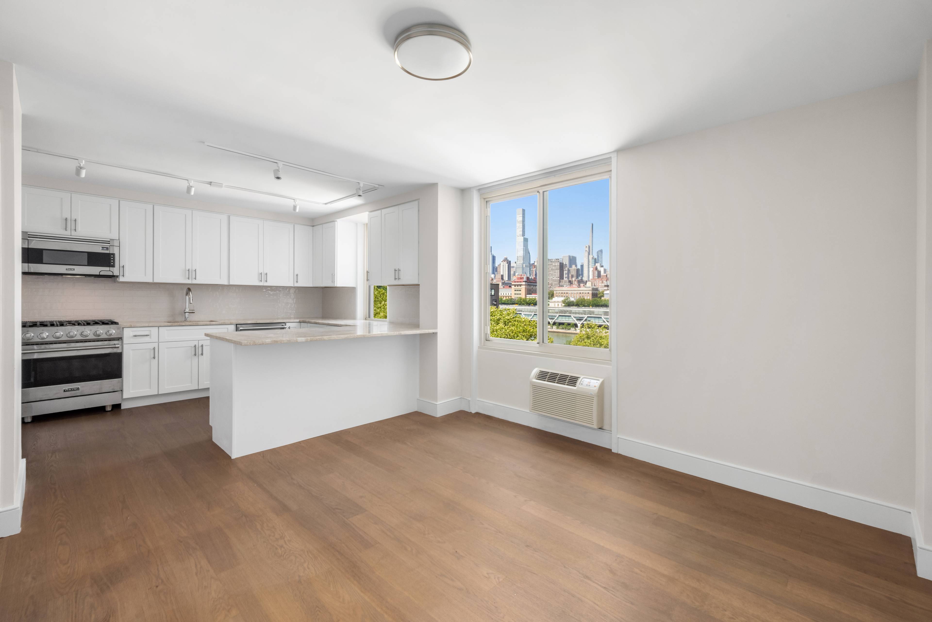 Welcome to Island House, where serene waterfront living meets city convenience just 90 seconds to Midtown Manhattan on the F train, or a short scenic ride via the Tram or ...